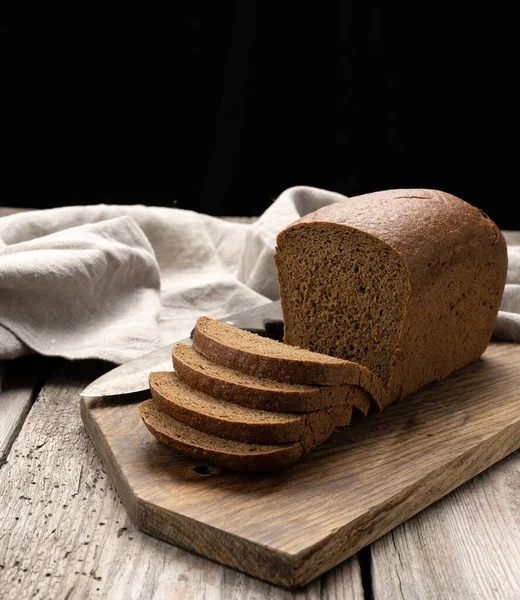 Φέτες Ψημένο Ορθογώνιο Ψωμί Σίκαλης Στον Καφέ Πίνακα Υγιεινά Τρόφιμα — Φωτογραφία Αρχείου