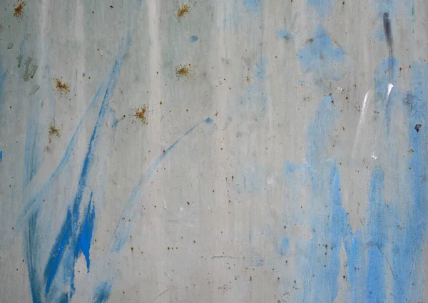 painted metal surface with blue paint with rust, full frame