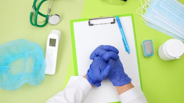 Top View Doctor Desk Who Bent Prayer Position Wearing Blue — Vídeos de Stock