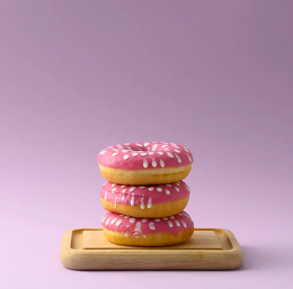Stack Pink Donuts Icing Purple Background Close — Stok fotoğraf