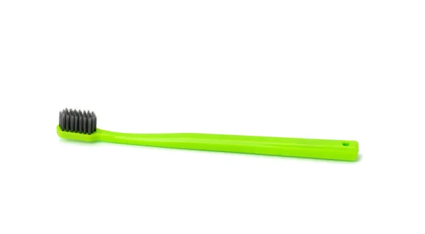 Πράσινη Πλαστική Οδοντόβουρτσα Απομονωμένη Λευκό Φόντο Προϊόν Υγιεινής Κοντινό Πλάνο — Φωτογραφία Αρχείου