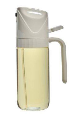 Arka planda plastik kapaklı sebze yağı için mutfak şişesi dağıtıcısı.