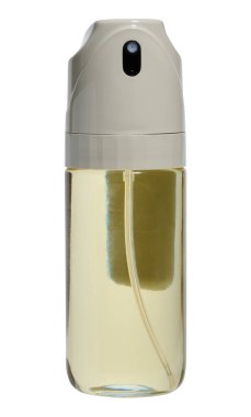 Arka planda plastik kapaklı sebze yağı için mutfak şişesi dağıtıcısı.