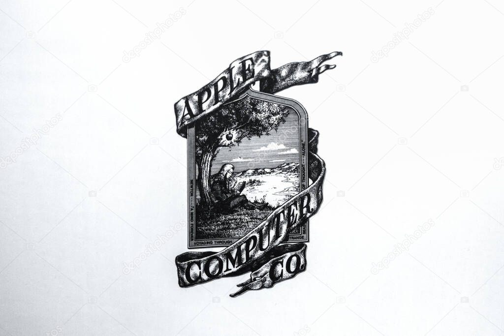 London, United Kingdom - August 13, 2022: The original vintage Apple Computer Co. logo featuring Isaac Newton under an apple tree, displayed at the Science Museum in London