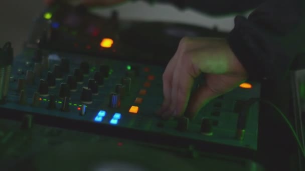 Hand moves on the remote switcher — Stock Video