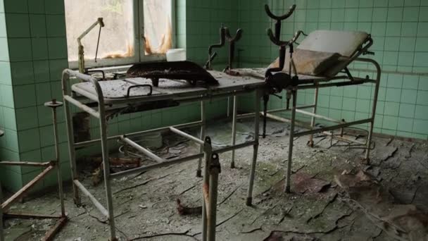 Gynecological Chair Abandoned Hospital Surgery Room Pripyat Chernobyl Nuclear Disaster — Stock Video