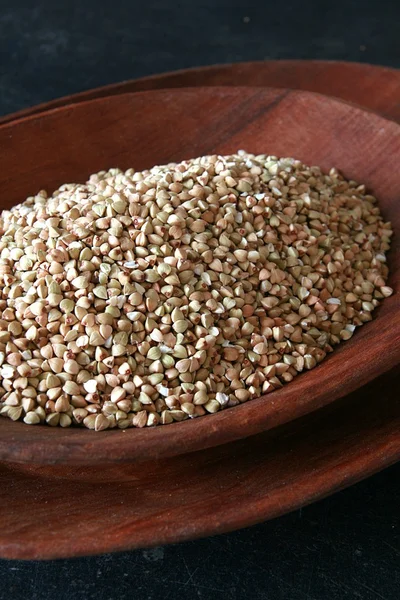 Peanuts in a wooden bowl — Stock Photo, Image