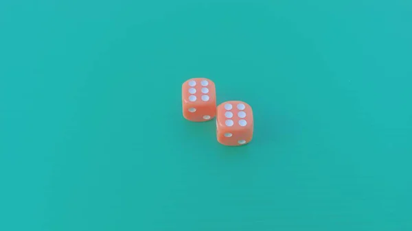 Pair of colorful dice placed on a bright green background.