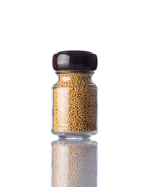 Jar senapsfrön isolerad på vit bakgrund — Stockfoto