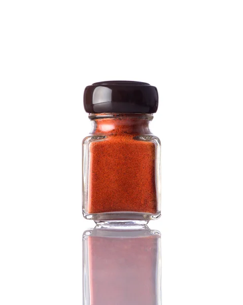 Jar rode Paprika poeder geïsoleerd op wit — Stockfoto