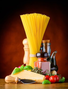 Italian Cuisine Spaghetti and Parmesan Cheese clipart