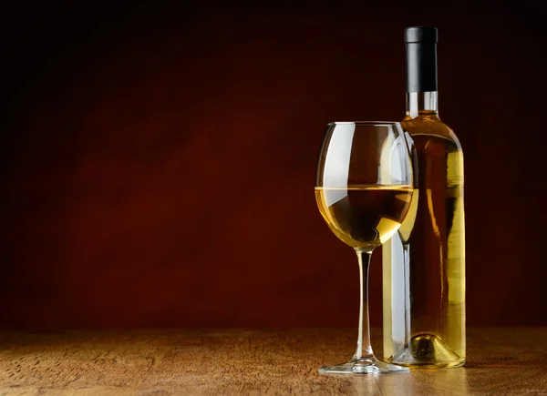 White wine in glass and bottle — Stock Photo, Image