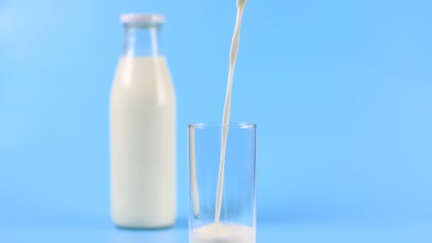 Milk pouring into glass — Stock Video