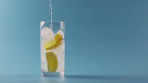 Mineral water pouring in glass — Stock Video