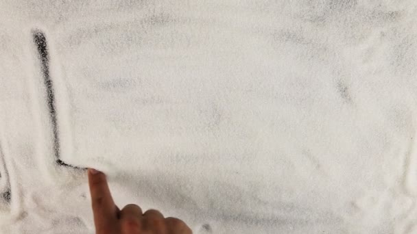 Мужчины рука рисует слово любовь на поверхности сахара — стоковое видео