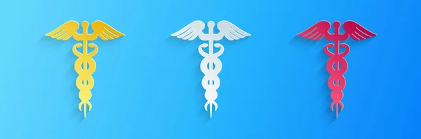 Papier Découpé Caduceus Icône Symbole Médical Isolé Sur Fond Bleu — Image vectorielle