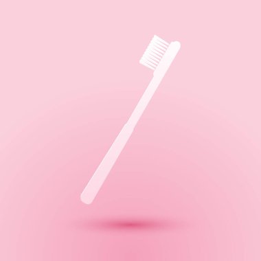 Kağıt kesiği diş fırçası simgesi pembe arka planda izole edilmiş. Kağıt sanatı tarzı. Vektör.