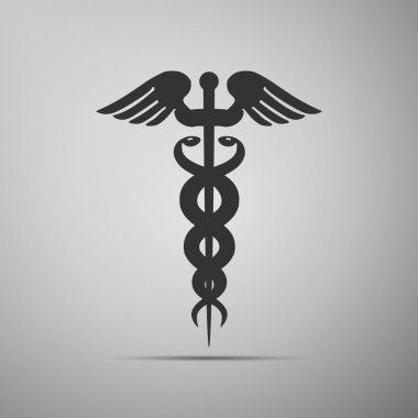 Uzun gölge caduceus tıbbi simgesiyle.