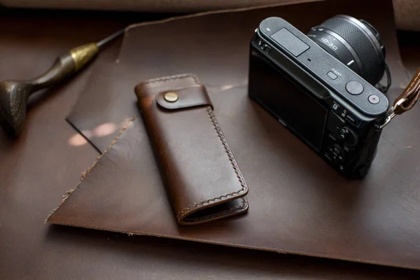 old vintage camera with a leather case, close up