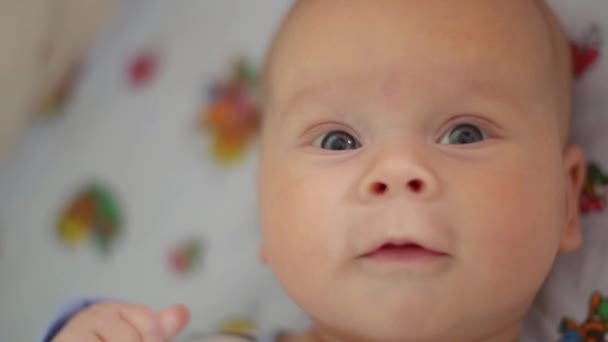 Cute baby feels confused — Wideo stockowe