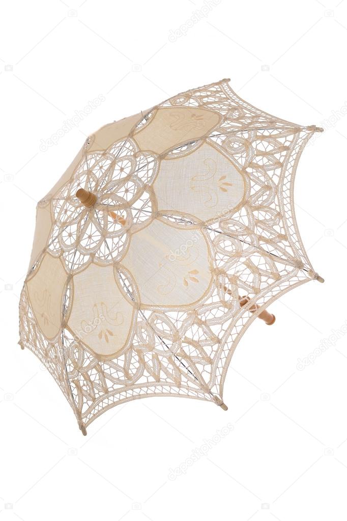 Bright lace umbrella in the clear