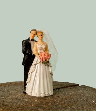 Bir gelin ve onun Damat Düğün figürler. Evlilik bebek.