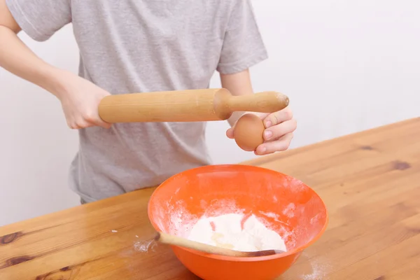 The grandmother and the grandson bake — Stock Photo, Image