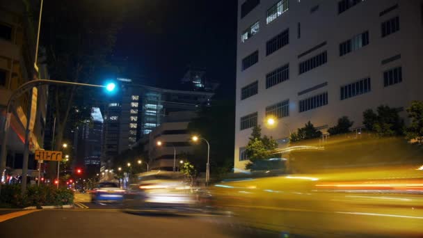 Cinemágrafo de tráfego congelado no tempo com semáforos em grande cidade — Vídeo de Stock