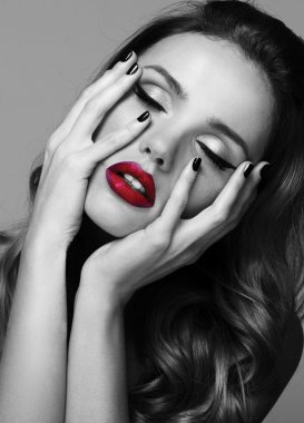 Beautiful model with make up and manicure