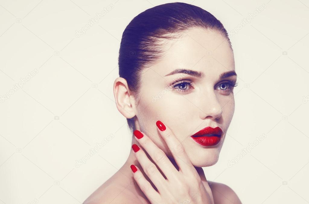 Beautiful model with make up and manicure