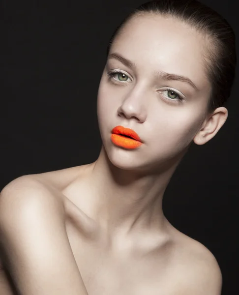 Young woman with orange lips — Stock Photo, Image