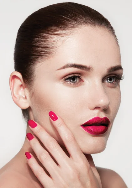 Young model with pink lips and manicure — Stock Photo, Image