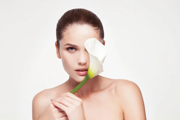 Young beautiful woman with flower — Stock Photo, Image