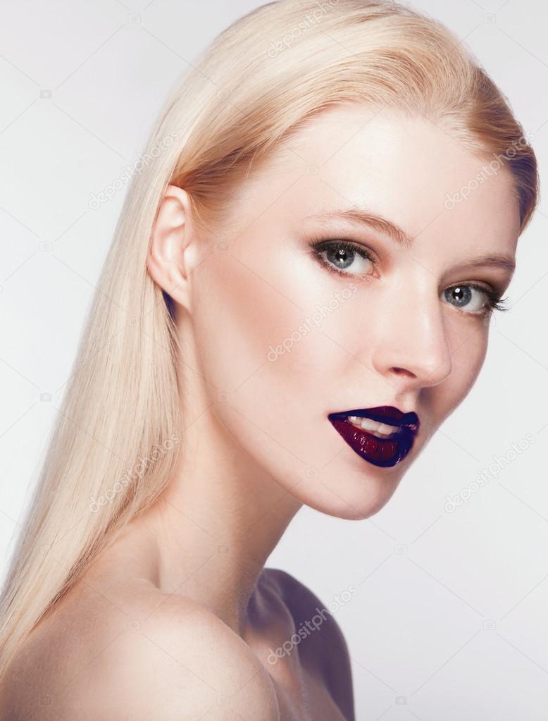 young woman with maroon lips