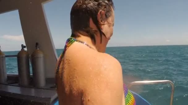 Woman at the Stern Diving Vessel Takes a Shower of Fresh Water After Diving — Stockvideo