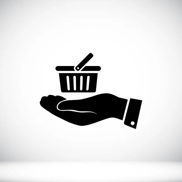 Shopping basket in hand icon — Stock Vector