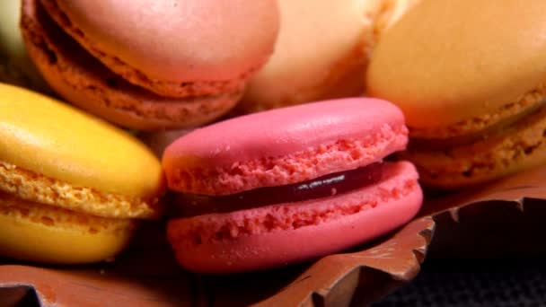 Super close-up panorama of delicious French almond macaroons — Stock Video