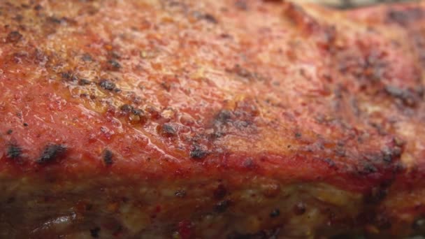 Super close-up of the juicy spiced delicious ribs frying and sizzling Video Clip