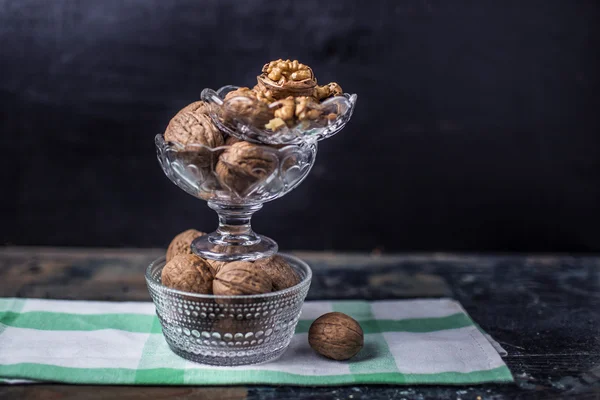 Walnut, walnut meat, dried fruit, nuts, delicacy, shell, glass bottle, bottle, — Stock Photo, Image