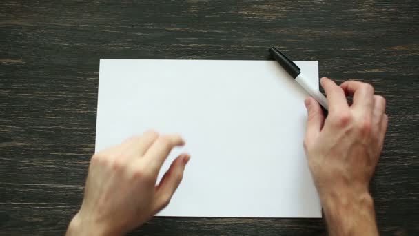 Hombre mano escribiendo no con marcador negro. Vista superior — Vídeos de Stock