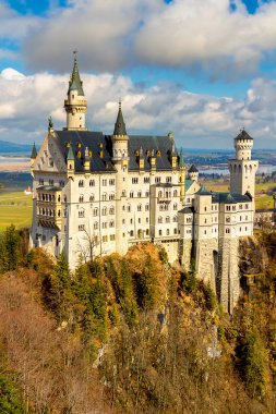 Beautiful view of world-famous Neuschwanstein Castle, the 19th century Romanesque Revival palace built for King Ludwig II, with scenic mountain landscape near Fussen, southwest Bavaria, Germany clipart