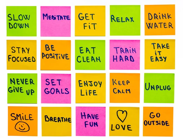 Motivational lifestyle reminders on sticky notes — Stock Photo, Image