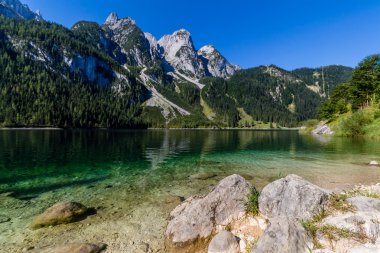 Beautiful landscape of alpine lake clipart