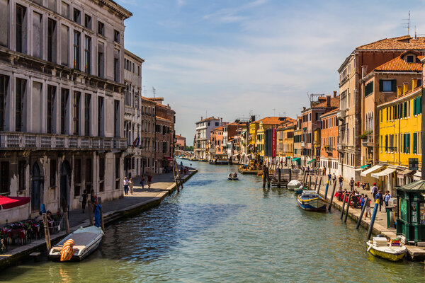 Venice cityscape, water canals and traditional buildings