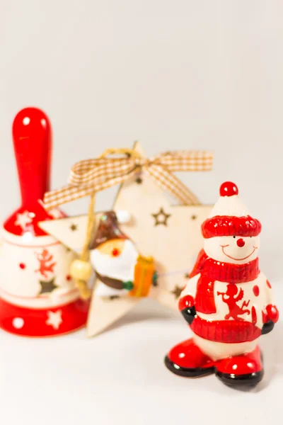 Boneco de neve, estrela de Papai Noel, sino — Fotografia de Stock