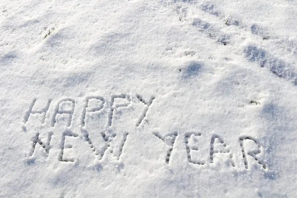 Szczęśliwy nowy rok komunikat na pole śniegu — Zdjęcie stockowe