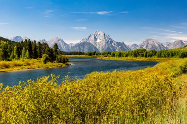 Views of the Grand Teton National Park and the Snake River clipart