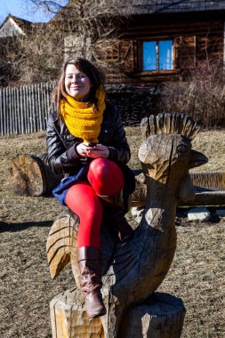 Girl in historic village Vlkolinec, Slovakia clipart