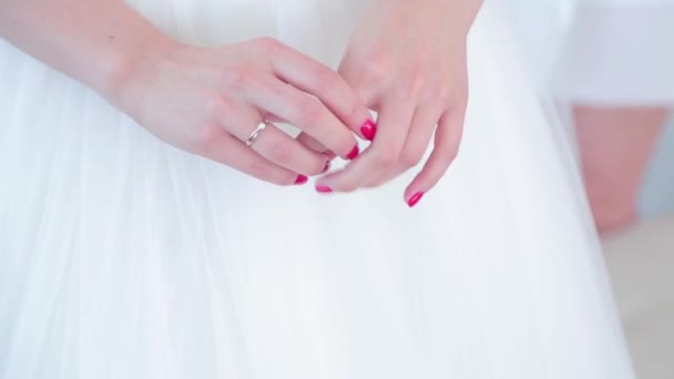Bride with red manicure nervous hands — Stock Video