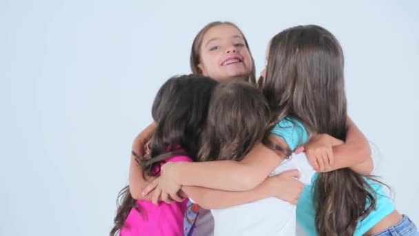 Little girls hugging and laaughing in the photo studio — Stock Video